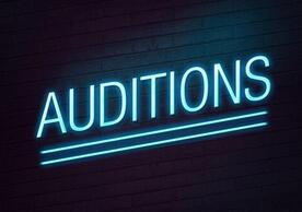 The word audition in neon blue.